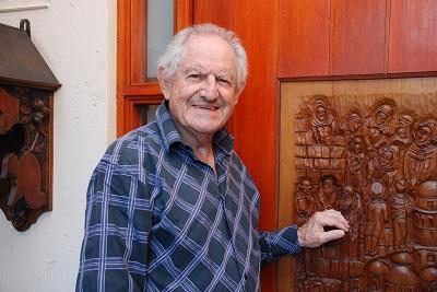 Dr Sidney Hirschowitz with one of the doors he has carved