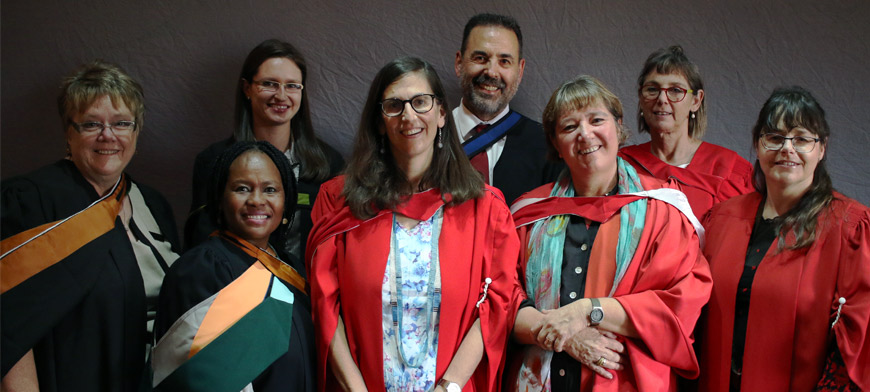  (Front from left) Janet Zambri, Thuli Dhlamini, Professor Karin Brodie (Head of the Wits School of Education), DrLaura Dison (PGDiPE(HE) Co-coordinator) and Jacqueline De Matos Ala. (Back from left)Agata Macgregor, David Merand and Estelle Trengove.