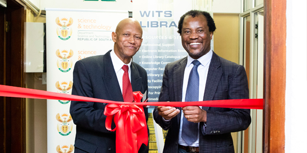 Dr Daniel Adams, Chief Director: Basic Sciences and Infrastructure, Department of Science & Technology and Professor Zeblon Vilakazi, Deputy Vice-Chancellor, Research and Postgraduate Affairs officially opening the new Wits Digitisation Centre